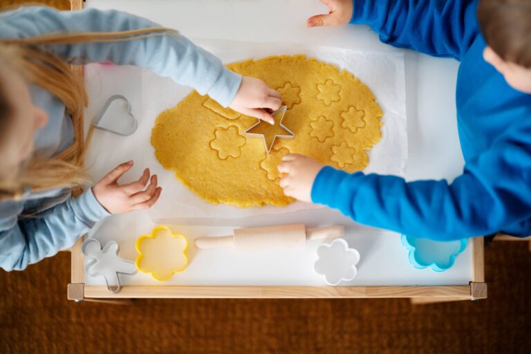 top-view-kids-making-cookies-together-1-scaled