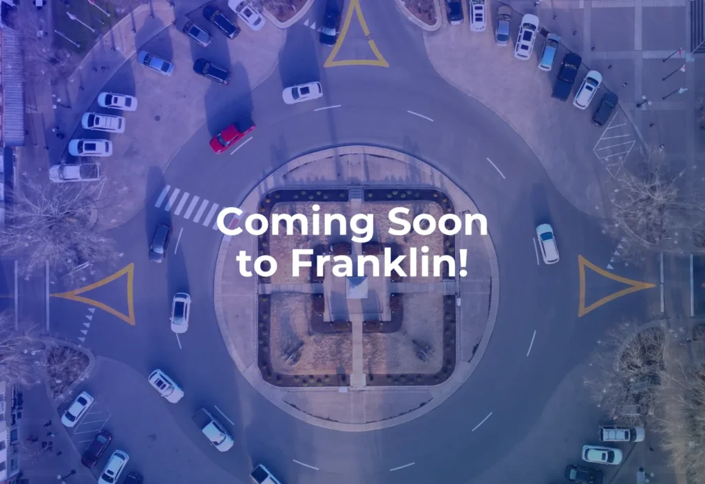 Aerial view of downtown Franklin, Tennessee with Coming Soon to Franklin text